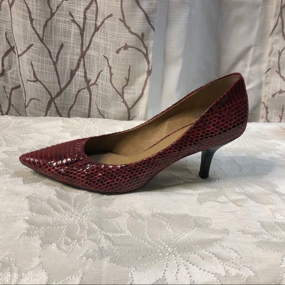Jessica Simpson size 10 red snakeskin short heel pump.